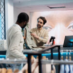 Unlocking your creative potential: a beginner\'s guide to crafting store cashier talking with customer 2024 02 09 19 40 56 utc